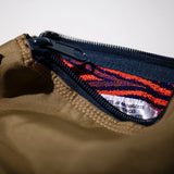 RUBBERISED HOOD FABRIC x JACQUARD POUCH