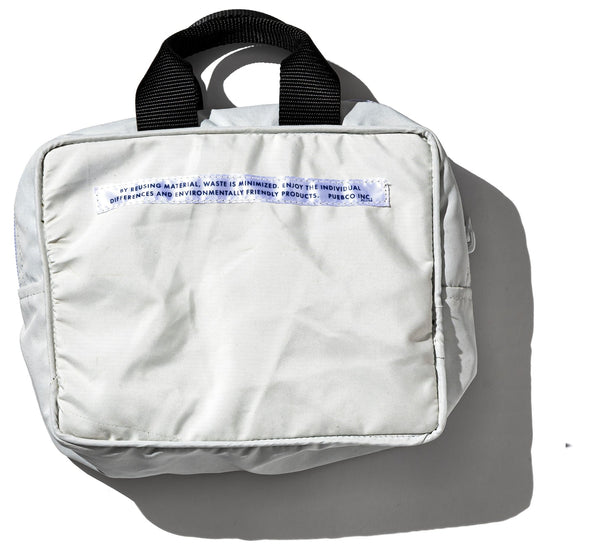 SNOW JACKET CONVERTED TO HANDBAG